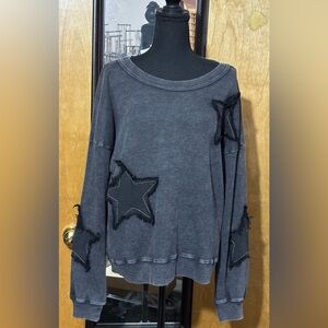 Women’s size S waffle knit pullover. Black/grey. Star embellishments.